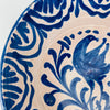 cobalt blue heraldic falcon motif on an antique Fajalauza lebrillo from Granada, showing the defined legs, curved beak and sweeping wing, with hand painted scrolls and Moorish-inspired border work, suitable for Mediterranean decor, rustic decor, Japandi, Wabi Sabi and vintage Spanish pottery collections.