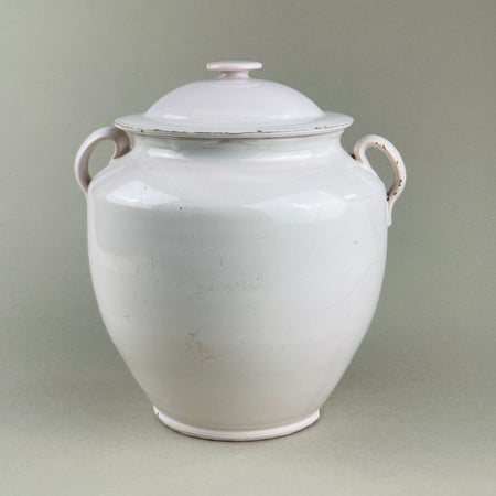 Antique French white confit pot with lid, also known as a traditional pot à conserve storage jar, crafted in stoneware from Martres Tolosane. Features loop handles, domed lid, and rounded form. Perfect decorative urn or rustic French farmhouse kitchen accent.