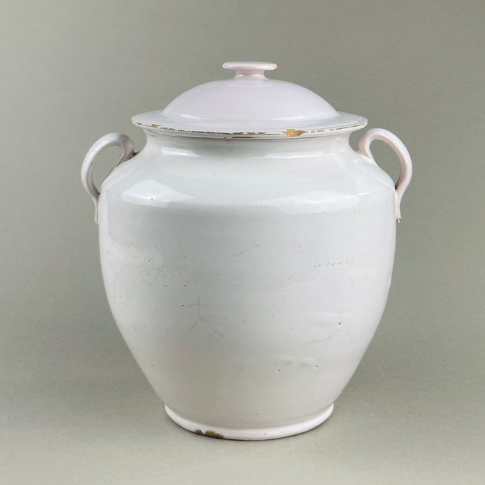 Antique Martres Tolosane confit pot shown with lid removed, highlighting wide rim and interior glaze. Traditional pot à conserve design, white ceramic glaze with wear and patina. A French rustic urn-style storage jar suited for decorative or practical display.