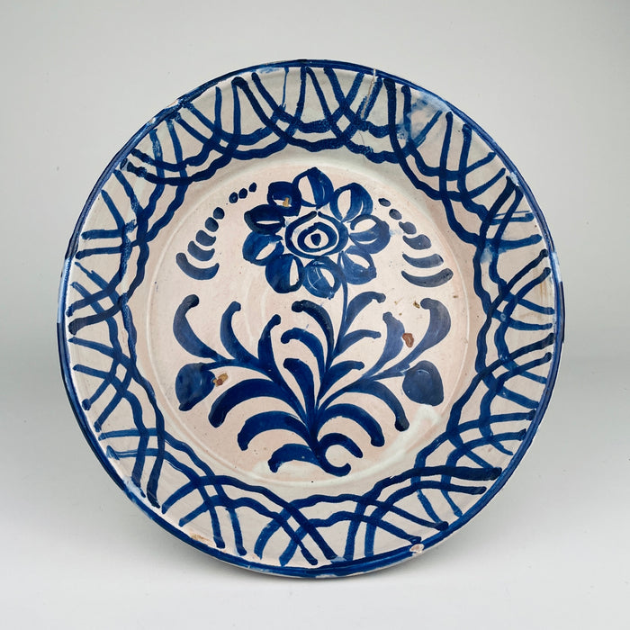 Antique Spanish Fajalauza lebrillo bowl, hand painted in cobalt blue with a central flower and geometric border, showing traditional Andalusian tin glaze from Granada, ideal for Rustic Home Decor, Cottage Decor, Coastal decor, French country decor, Mediterranean Decor, Japandi, and wabi sabi styling in vintage kitchens or farmhouse decor displays.