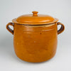 Matching domed lid from a large antique Vallauris marmite, finished in mustard and honey ochre glaze with a circular knob and broad fitted rim. The glazed terracotta cover completes this rare French confit pot and lidded crock by Foucard Jourdan, an evocative example of Provence pottery and antique French cookware.