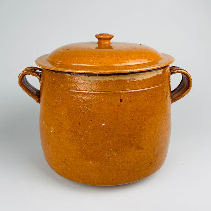 Matching domed lid from a large antique Vallauris marmite, finished in mustard and honey ochre glaze with a circular knob and broad fitted rim. The glazed terracotta cover completes this rare French confit pot and lidded crock by Foucard Jourdan, an evocative example of Provence pottery and antique French cookware.