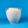 Antique French confit pot made of white glazed stoneware pottery with craquelure glaze and two side handles, originating from Martres Tolosane France. Its aged glaze confirms authenticity and makes it ideal for farmhouse decor or wabi sabi interiors.