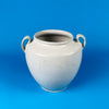 Top view of white glazed antique confit pot with round opening and twin handles, highlighting the traditional French craftsmanship of Martres Tolosane workshops and its charm in wabi sabi or japandi interiors.