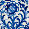 The deep basin and raised foot of this large Granada Fajalauza lebrillo demonstrate the strength of its traditional earthenware form. Loose cobalt blue brush motifs decorate the creamy exterior, while the hand painted sunflower and wave bands continue across the interior. The bowl is suitable for Spanish decor, French country decor, cottage decor, farmhouse decor, or use as a striking ceramic centerpiece.