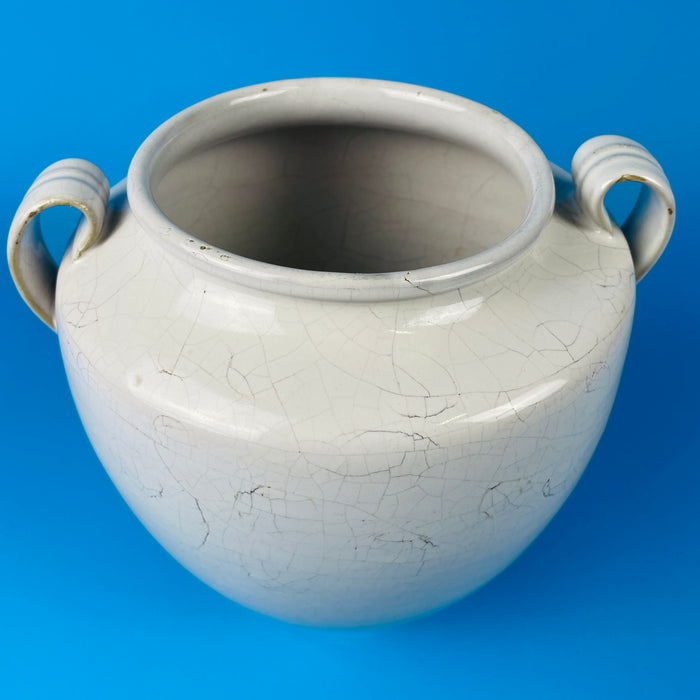 Top view of white glazed antique confit pot with round opening and twin handles, highlighting the traditional French craftsmanship of Martres Tolosane workshops and its charm in organic modern interiors.