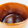 Large Foucard Jourdan marmite presented as a decorative French pottery centerpiece, its ochre glazed body and fitted lid complementing natural textiles and kitchen ingredients. This signed antique Vallauris crock brings authentic Provence pottery, French farmhouse decor and warm Mediterranean decor character to a kitchen or dining room.