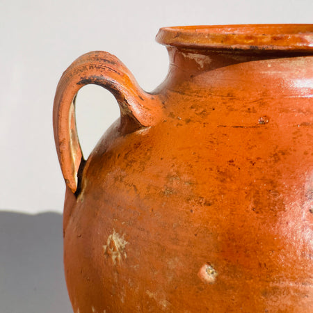 Close-up of the jar’s rim and handles, highlighting traditional Spanish pottery craftsmanship.