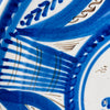 antique Spanish majolica plate measuring 29.5 cm wide, with a cobalt bird framed by dense radial geometry on white glazed earthenware. Its scale is clear when held, while the deep shallow bowl form and bold hand painted pattern allow the Talavera charger to anchor a collected plate wall or eclectic decor scheme.