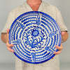 Large hand painted ceramic bowl from Granada, Spain, shaped as a traditional lebrillo with a wide open basin and raised foot. Cobalt blue wave bands radiate around a stylized sunflower and scrolling vegetal forms, while the white glazed ground highlights the expressive brushwork. The piece brings a strong Spanish pottery accent to Mediterranean decor, French country decor, vintage kitchen displays, and cottage decor.