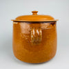 Complete antique French confit pot with its matching domed lid in place, two generous loop handles and a softly rounded high-form body. The signed Foucard Jourdan Vallauris marmite has a rich mustard ochre glaze and substantial proportions suited to French farmhouse kitchen decor, rustic home decor or a collected pottery display.
