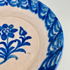 Detail view of the scalloped rim border on a Fajalauza Granada lebrillo, showing hand-painted cobalt lines with softly blurred edges from traditional kiln firing. This antique Spanish ceramic wall bowl can be displayed as wall hanging ceramic, styled as a table centerpiece, or used as a decorative serving bowl in Mediterranean Decor and Coastal Decor homes.