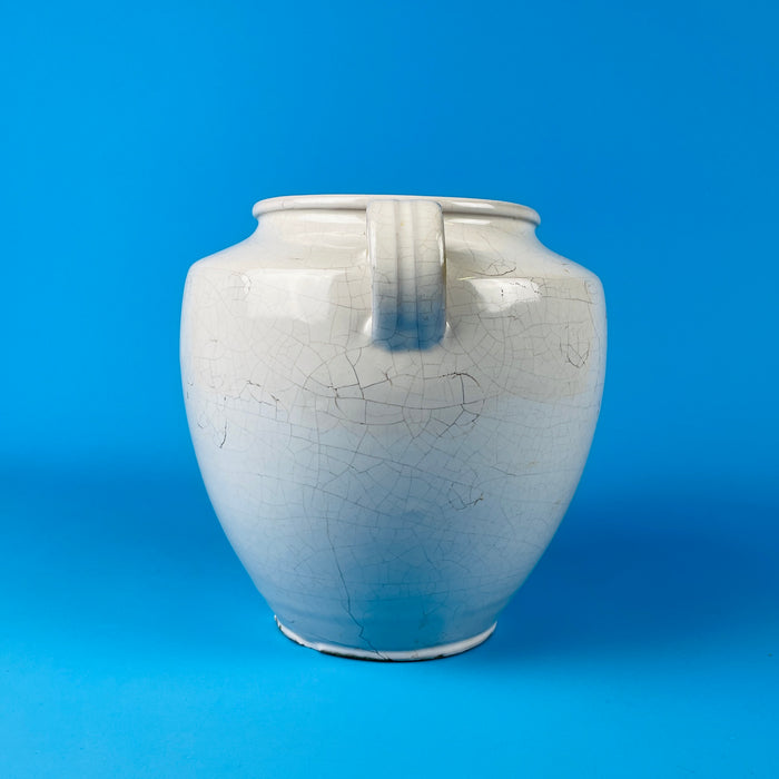 Close-up emphasizing the soft gloss and craquelure glaze of the French antique confit pot, combining farmhouse authenticity with organic minimalist aesthetics for timeless home decoration.