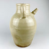 Substantial early 20th century French terracotta jug measuring 32 cm high and 22 cm across the handles, with a weight of 2.9 kg. Its generous scale, full rounded body and pale glazed surface make the antique cruche pot an assertive decorative object for a console, floor display or large shelf.