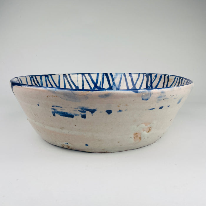 Hand painted Fajalauza bowl from Granada featuring cobalt floral decoration and geometric border patterns typical of 19th century Spanish tin-glazed ceramics, displaying natural irregularities and suitable for farmhouse decor, Cottage Decor, Rustic Home Decor, Mediterranean wall styling, wabi sabi, Japandi and Coastal decor inspiration.