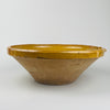 Antique French tian bowl in large 39cm size shown upright with warm yellow glaze and traditional pouring notch, highlighting rustic terracotta craftsmanship from the South of France. Ideal for farmhouse kitchen styling, Mediterranean interiors, and French country decor, adding authentic utilitarian pottery character to shelves or kitchen tables.