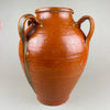  Spanish terracotta vessel with its wide opening and smooth glazed interior. The glossy earthenware surface reflects early 1900s Castilian craftsmanship, a perfect decorative jar or statement vase for farmhouse decor.