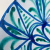 Granada Fajalauza lebrillo bowl in tin glazed terracotta, hand painted in cobalt blue and copper green with a radial rosette and vegetal geometry. 