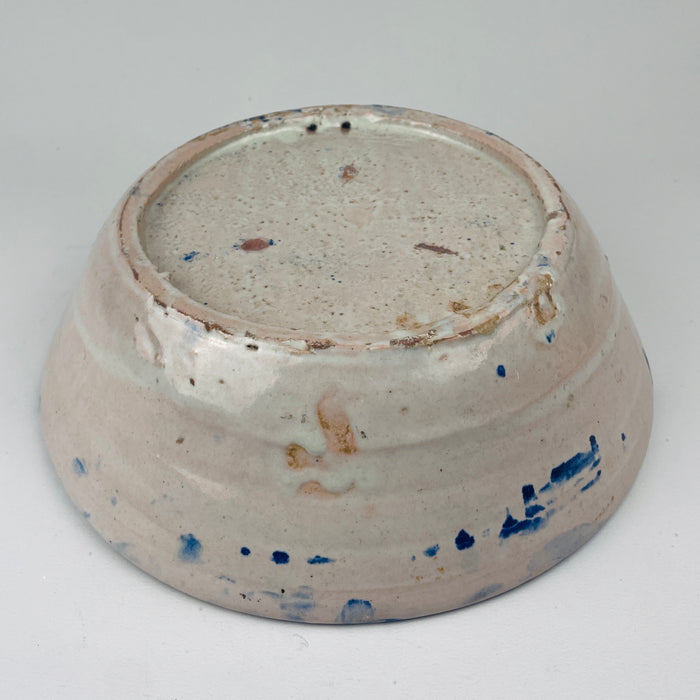 Underside of hand painted Fajalauza ceramic bowl, 19th century Granada tin glaze, used historically as a kitchen and household vessel, now perfect for Rustic Home Decor, Cottage Decor, Coastal decor, Japandi, wabi sabi, Mediterranean Decor, Vintage Kitchen displays or farmhouse decor wall accents in French country decor homes.