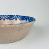 Fajalauza Granada lebrillo, showing hand-painted cobalt lines with softly blurred edges from traditional kiln firing. This antique Spanish ceramic wall bowl can be displayed as wall hanging ceramic, styled as a table centerpiece, or used as a decorative serving bowl in Mediterranean Decor and Coastal Decor homes.