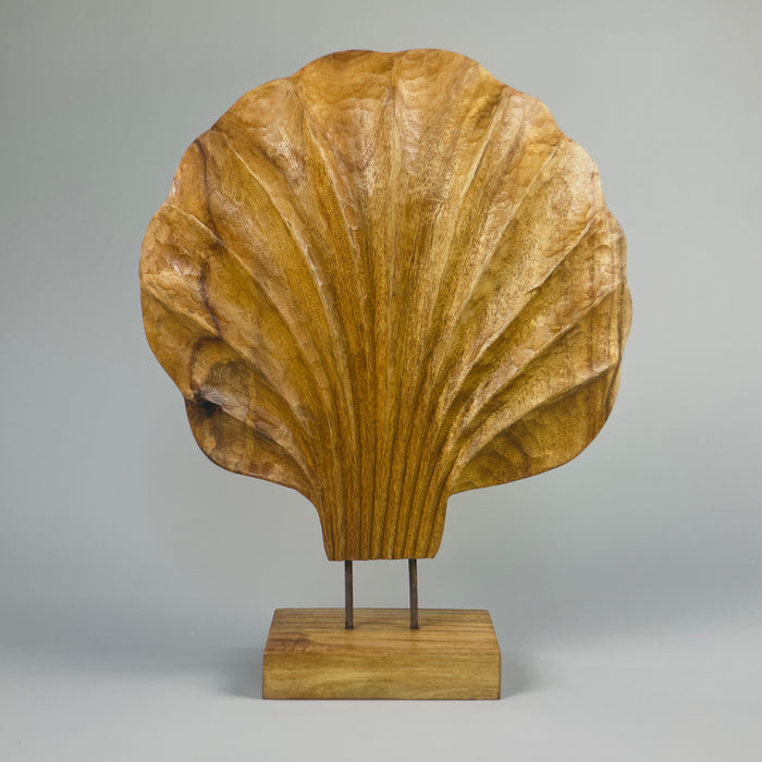 wood shell sculpture by ROC Objects, showing the hand-carved fluted ridges and organic silhouette in solid acacia wood. Ideal for Japandi, Wabi-Sabi, or modern rustic interiors where natural sculpture adds texture and warmth to a shelf or console.
