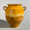 vintage French terracotta confit pot with traditional ochre glaze, rustic character, and natural surface wear, ideal for farmhouse or Mediterranean style interiors.