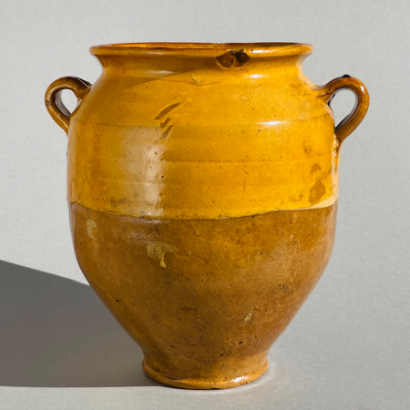 19th-century French antique confit jar in terracotta with ochre glaze, rustic farmhouse kitchen pottery from Southwest France, featuring twin handles and authentic aged patina.