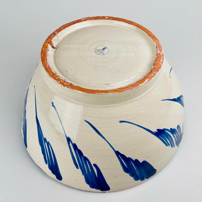 Blue and white Spanish Fajalauza bowl by Cerámica Los Arrayanes, with an open flared profile and a richly decorated interior of floral, looping and scalloped motifs. The cobalt brushwork continues across the outer wall in broad gestural marks, creating a large handmade Granada pottery centerpiece suited to serving, tabletop display or wall decor.