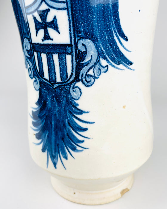 Flared circular mouth of a vintage Spanish Talavera ceramic albarello, with a broad rolled lip, short narrowing neck and smoothly curving upper shoulders. The glossy cream white glaze shows small age-related surface irregularities and light wear around the opening. The traditional apothecary jar profile also works as a decorative pottery vase in a collected interior.