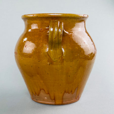Rustic French antique jar with beautiful patina, perfect for wabi-sabi or rustic home decor settings.