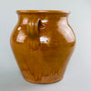Ochre glazed confit pot from late 19th century France, handmade with traditional techniques for rustic kitchen or decor use.