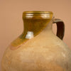 The unglazed base of this antique Spanish terra    scotta vessel reveals wheel marks and firing residue from its 19th-century production. A hallmark of authentic hand-thrown earthenware craftsmanship cherished in farmhouse decor.