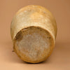 Underside of the earthenware vessel, displaying coarse terracotta and firing traces. The imperfections contribute to its authentic aged appeal, perfect for organic minimalist decor or Spanish rustic interiors.