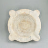 Front view of antique French marble mortar, hand-carved in the 18th century with rustic farmhouse style, measuring 30 cm wide.