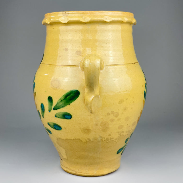 spanish vessel, showing both handles, the full foliate motif, and its balanced proportions. This antique Lucena orza is a collector’s piece suitable for rustic kitchen decor, wabi sabi or vintage display.