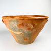 Large Spanish terracotta bowl with a deep conical profile, two opposing handles and a broad irregular lip, sourced in Cuenca and dated to the late 18th century. The exterior combines warm orange clay with grey-green patina, glaze traces and worn patches, creating a sculptural antique pottery vessel for farmhouse, rustic or Mediterranean decor.