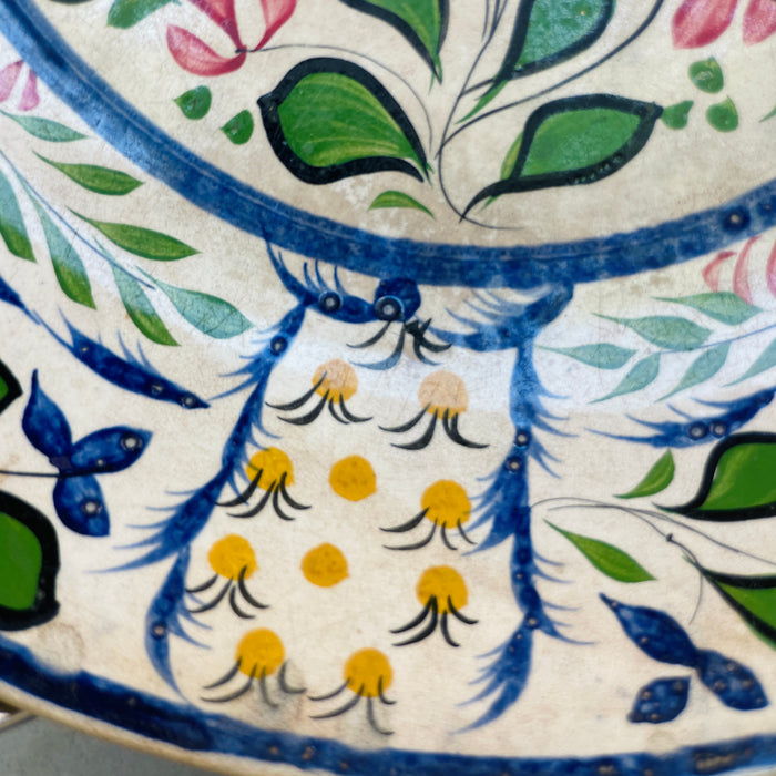 Arts and Crafts era floral centerpiece platter, ideal for display or entertaining, with painterly brushwork. 
Detail of hand-painted botanical motif in vibrant polychrome colors on antique English ceramic plate.