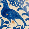 Interior glaze of the lebrillo bowl with visible signs of age including softened pigment, light crazing, and minor discoloration that enhance its historical character and authenticity as a 19th-century folk ceramic piece.