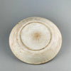 Back detail of English ceramic platter showing worn Victorian glaze and classic foot ring.