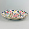 Rear view of late 19th-century English ceramic platter, showing aged glaze and unmarked foot rim with natural wear.