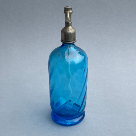 Decorative French siphon bottle with streamlined Art Deco profile and vibrant blue coloring, perfect for eclectic or retro interiors.