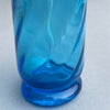 Artisan-crafted vintage blue bottle with siphon stem visible inside, highlighting quality and authenticity of early 20th-century production.