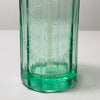 Close-up of etched lettering reading "SIFON HIGIÉNICO" and "JOSE CERVERA SAN FELIU DE GUIXOLS," showcasing authenticity and origin of this vintage Catalan soda siphon bottle. Light-filled image showcasing the clarity and thickness of vintage green soda glass and its etched typography from the 1950s.
