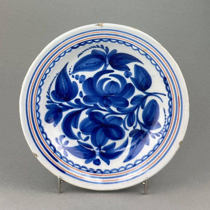 Decorative Spanish Majolica, front view with scalloped rim pattern and bold color scheme, suitable for wall display or centerpiece.