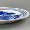 Large Spanish wall plate, displayed on a neutral background to emphasize its vibrant palette and traditional design.