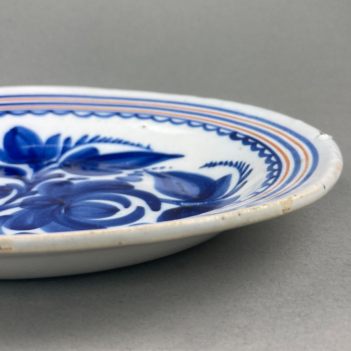 Large Spanish wall plate, displayed on a neutral background to emphasize its vibrant palette and traditional design.