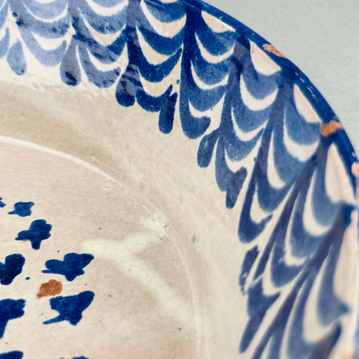 Historic ceramic vessel styled as Mediterranean wall décor or tableware, featuring regional symbolism and handmade charm.
