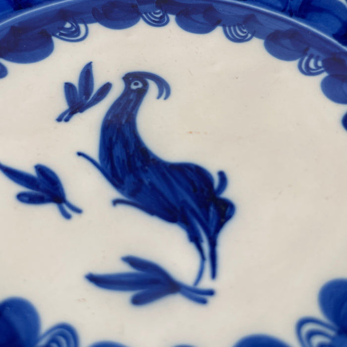 Detail of the hand-painted border design with traditional fan and petal-like shapes, typical of Spanish Manises ceramic artistry from the 19th century.