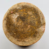 Underside image of French water jug with raw, unglazed terracotta base showing textured surface wear and firing marks, indicative of handmade production, often sought after for authentic wabi-sabi or rural European decor.