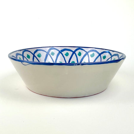 Spanish Fajalauza bowl with green and blue hand painted decoration, made as a deep Granada pottery platter with a wide rounded form and glossy glazed surface. The design includes cobalt lattice lines, abstract green vegetal marks, and a blue rim, suitable as ceramic wall bowl decor, tabletop display, or decorative fruit bowl.